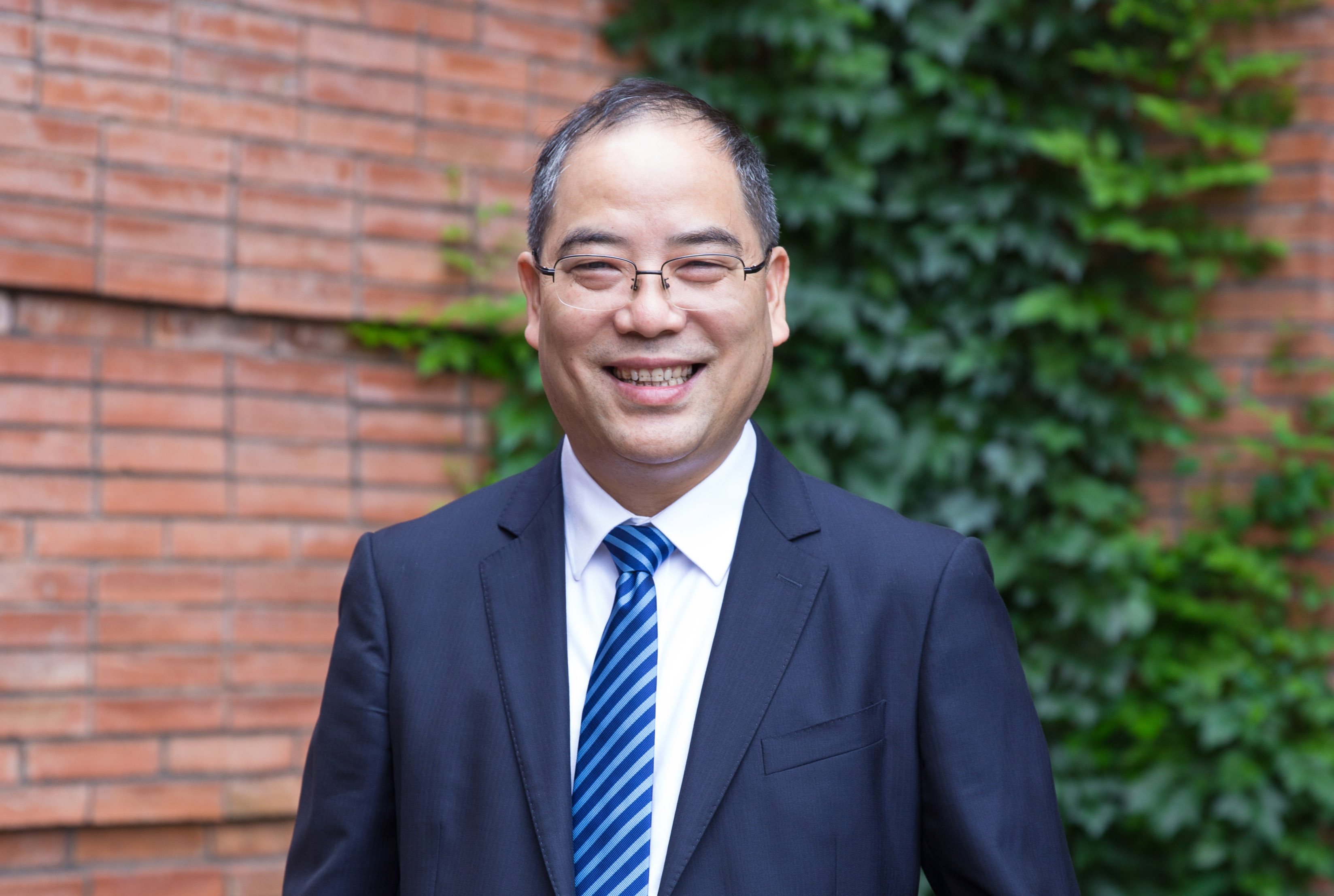 浙江工商大學黨委書記、教授 郁建興